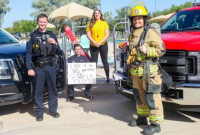 photo of police officer, lifeguard and firefighter at a public pool in Chandler