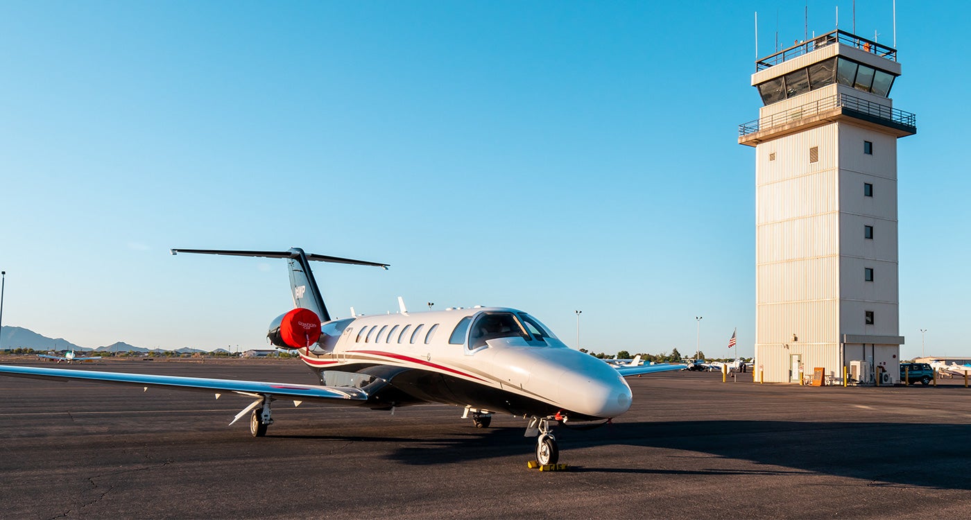 CHD Tower flanked by a plane