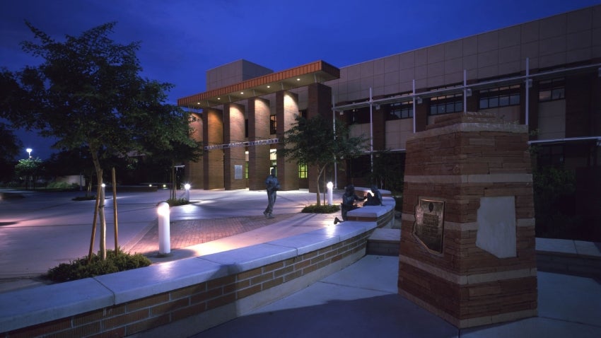 Chandler Police Department Building lit purple for Domestic Violence Awareness Month