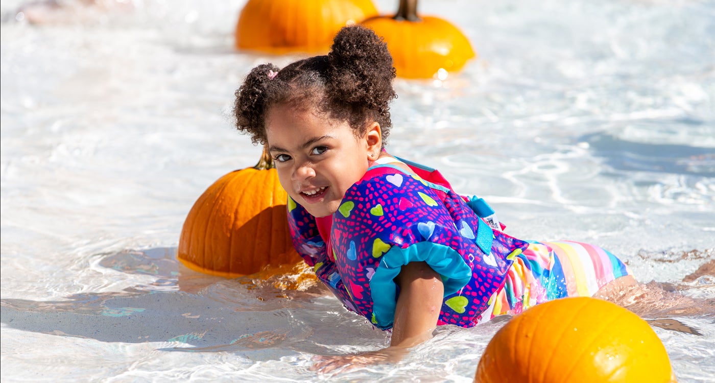 pumpkin dunk young girl with pumpkins