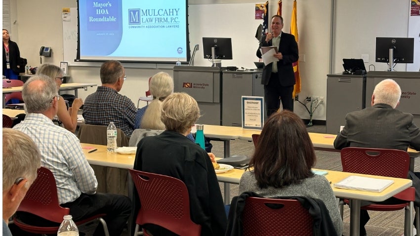 Mayor Kevin Hartke presenting infront of a HOA Roundtable participants