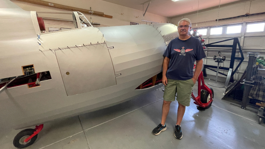 Mac Transtrum staning next to the Gee Bee he built Mac Transtrum staning next to the Gee Bee he built