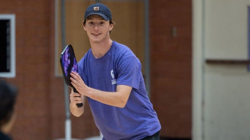 teen playing pickleball