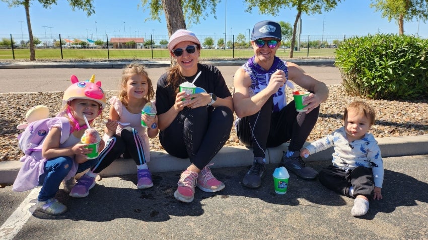 Family Bike Ride: Family enjoying snow cones Family Bike Ride: Family enjoying snow cones