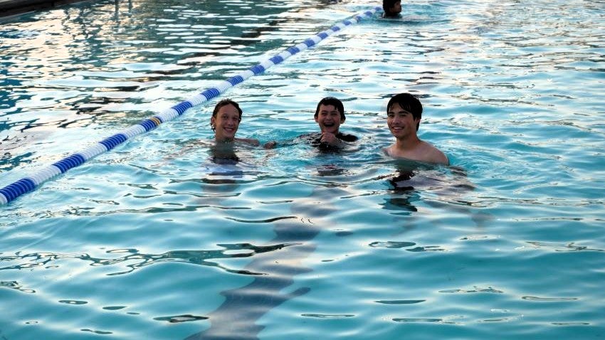teen boys at swimming pool