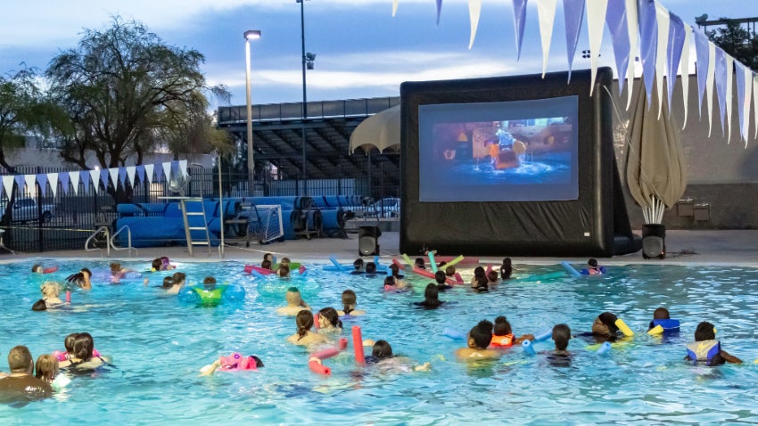 kids swimming and watching a movie