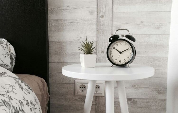 bed and alarm clock for sleep tips