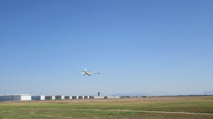 Small plane landing at the Chandler Airport
