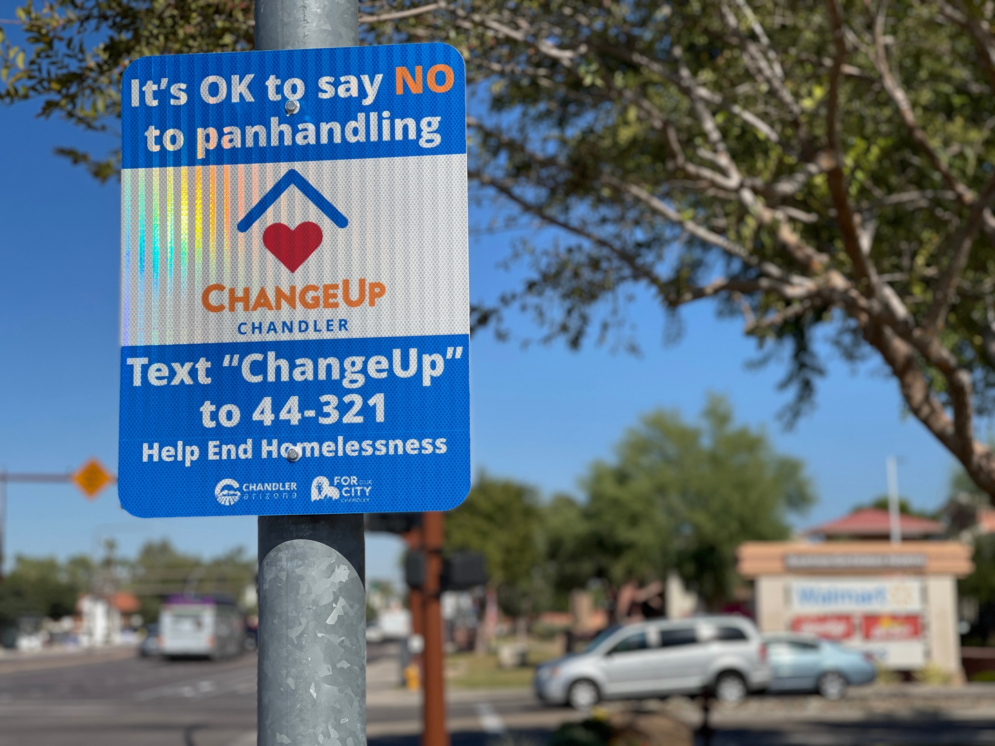 Change Up sign on a light pole