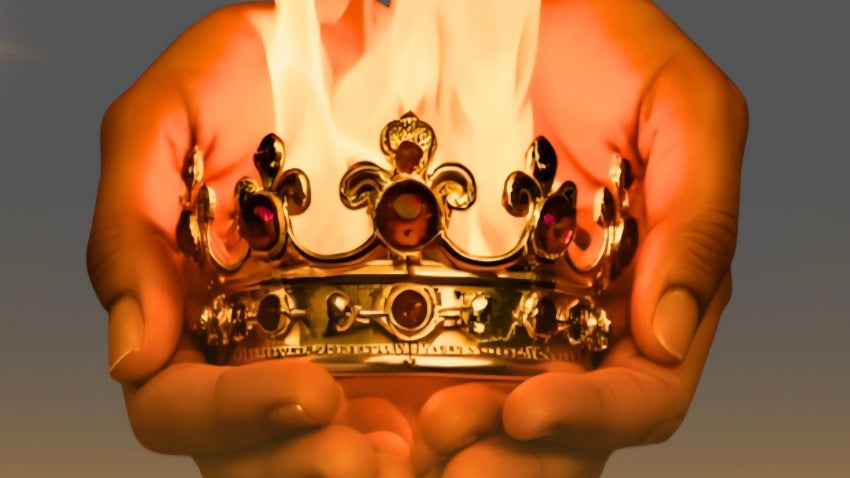 hands holding a crown on fire