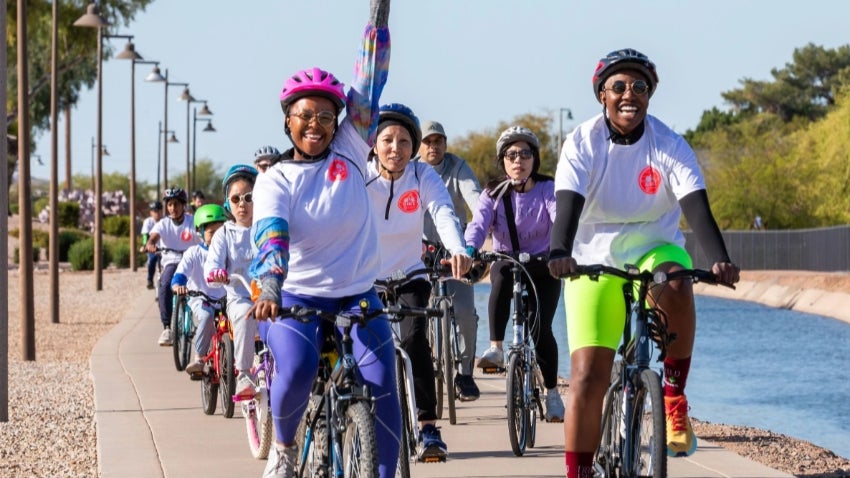 Family Bike Ride: Group enjoying a ride along Paseo Trail