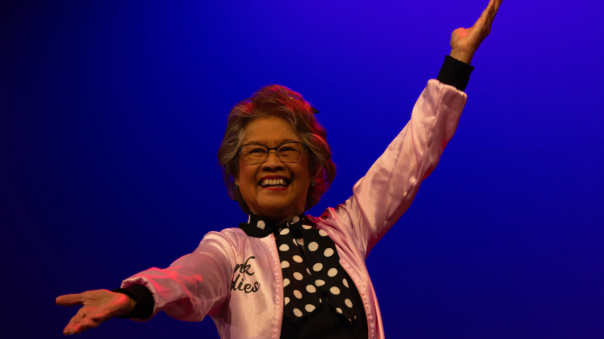 active adult dancing on stage