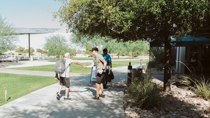 Volunteer directing guest