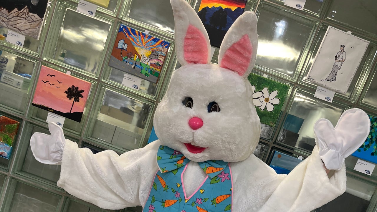 easter bunny waving to people