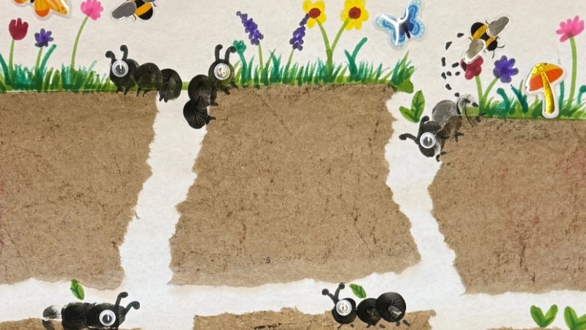 Paper craft ants on a hill
