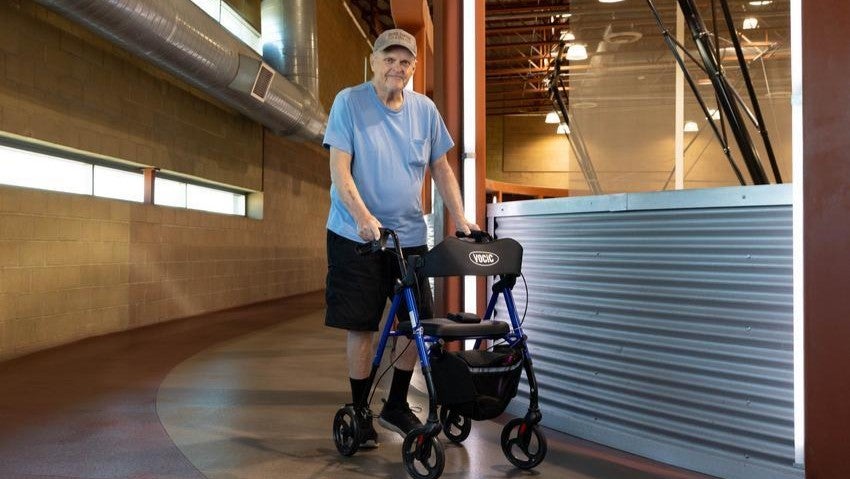 man using a walker at the TRC