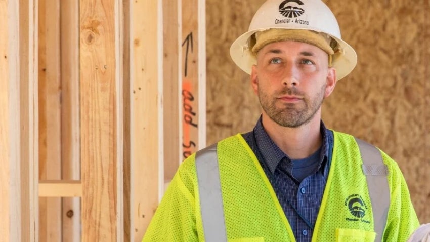 Man wearing a hard hat on construction site