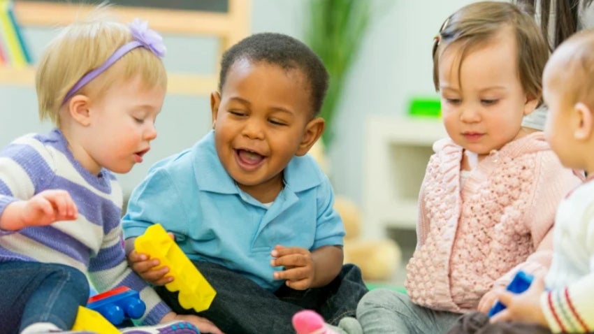 Group of babies playing