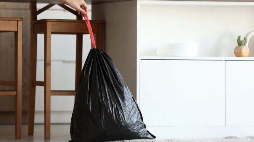 Full trash bag securely tied