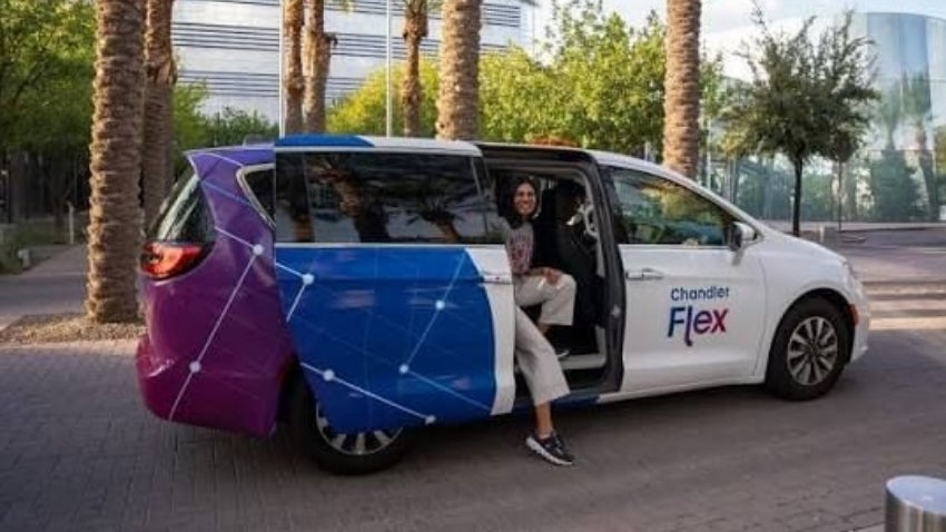 Women getting out of a Chandler Flex vehicle