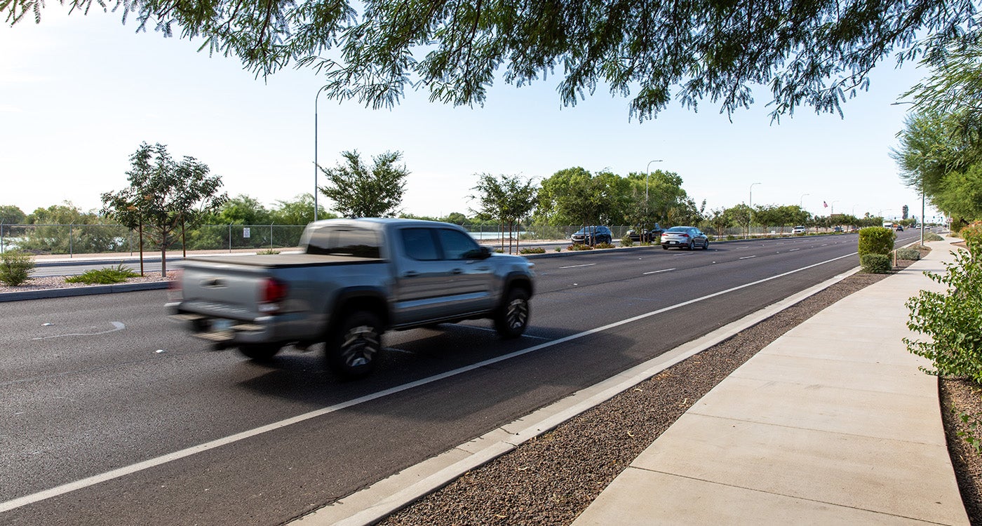 Vechiles driving down Gilbert Road in Chandler