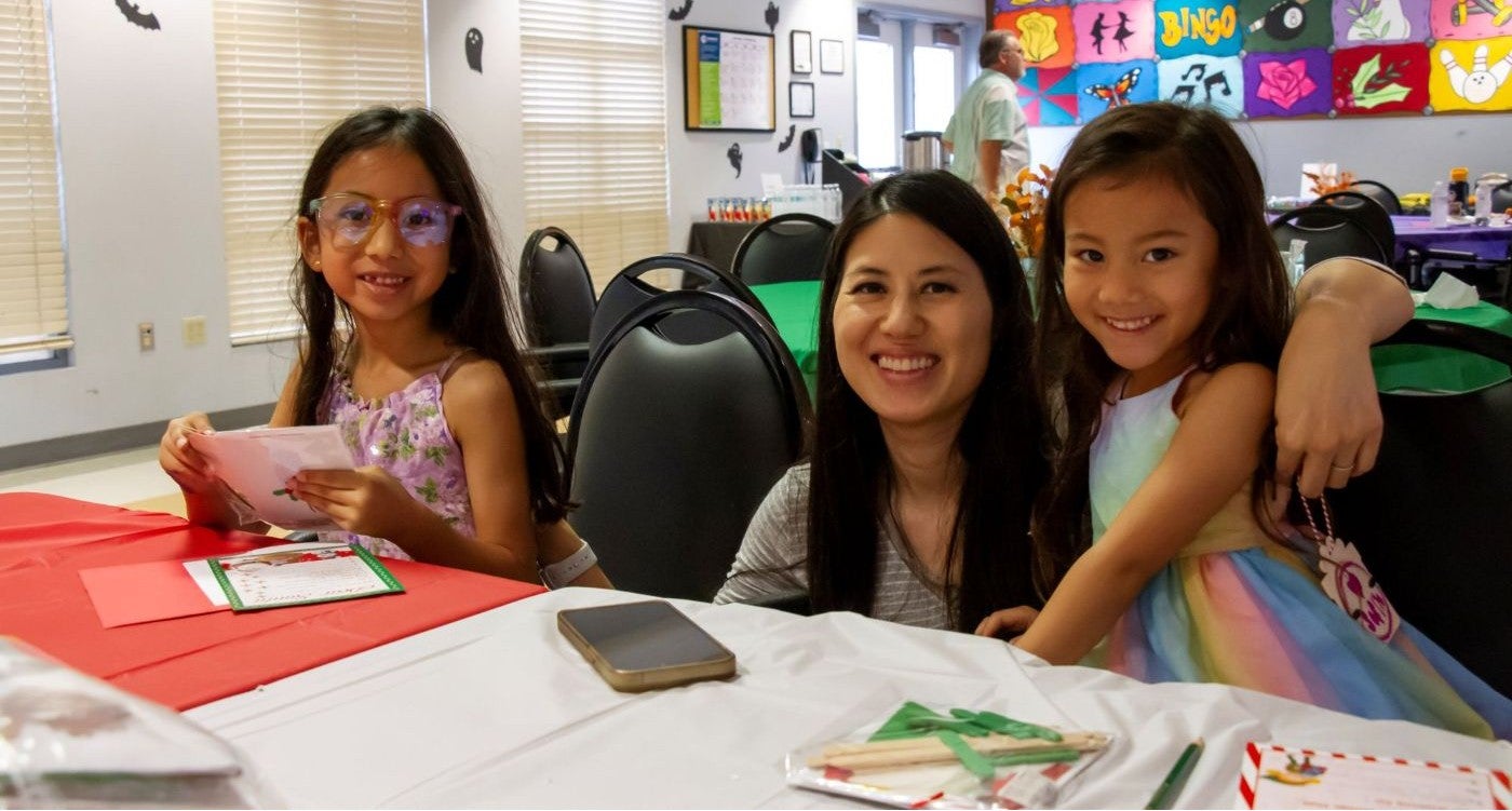 group of kids doing a craft