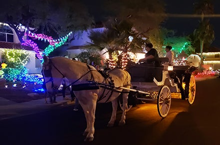 Christmas on Upland Drive in Chandler features a horsedrawn carriage
