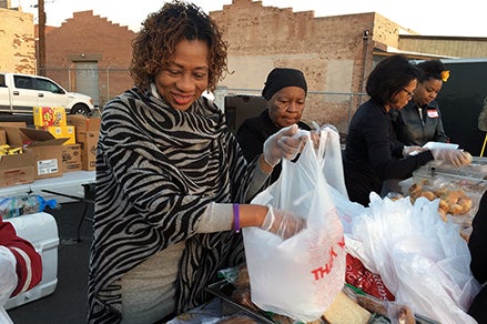 Councilmember Christine Ellis volunteering during Black History Month