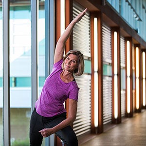 Active adult women practicing yoga