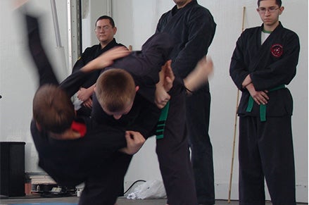 Youth participating in a martial arts class