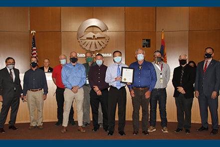 Building Safety Team accepting the proclamation during a City Council meeting