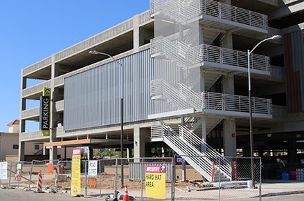 The entrance to the new Oregon Street Parking Garage. The LED screening is visible over the stairwell.