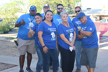 Priscilla Quintana with coworkers during a service project