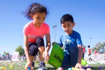 photo showing children collecting eggs at Family Easter Celebration in Chandler