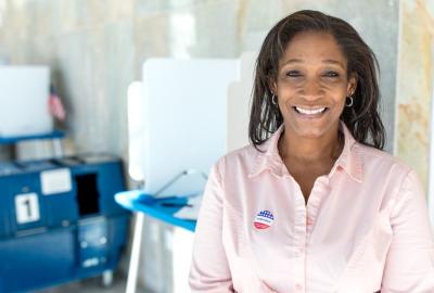 Female voter at a polling location
