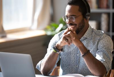 Man using a computer at home