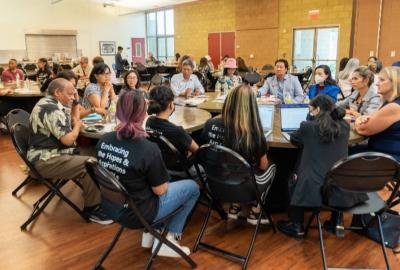 Attendees seated a roundtables during last year's AAPI conference