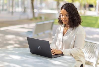 City employee working on a laptop
