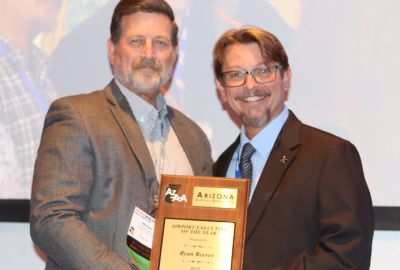 CHD Airport Manager Ryan Reeves accepting an award during AzAA Conference