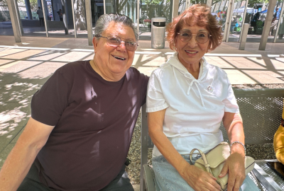 Golden neighbors (man and woman) during a prior Golden Neighbors event