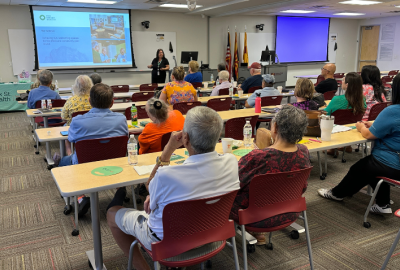 Oak Street Health presenting to Golden Neighbors event attendees
