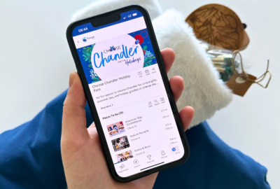 Cell phone with Choose Chandler Holiday Pass onscreen