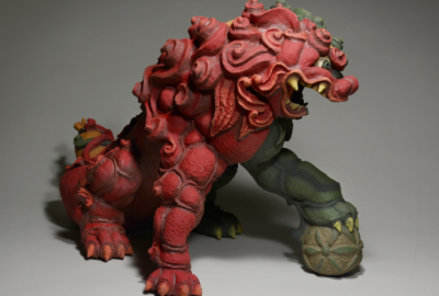 Red and green sculpture of a dragon