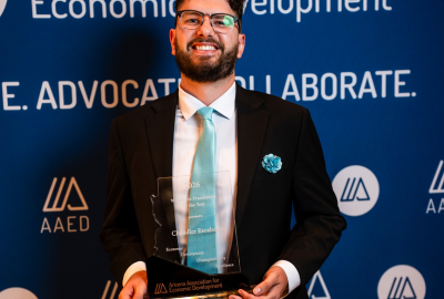 Chandler Escalante holding award for 2026 Workforce Practitioner of the Year