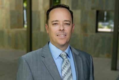 Headshot of Chandler Economic Development Director Micah Miranda