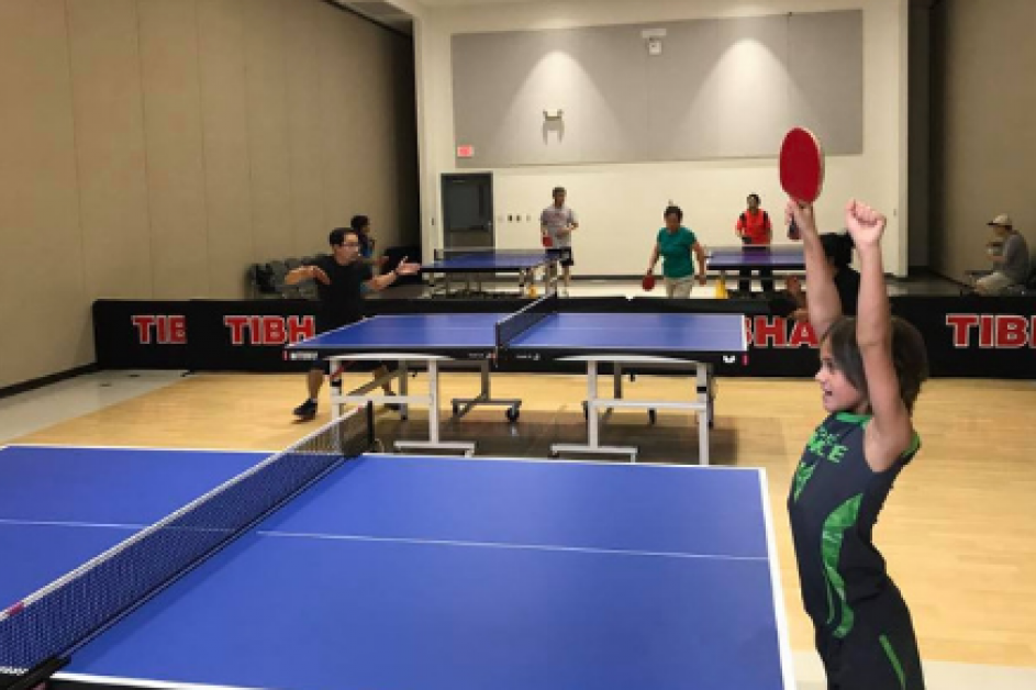 Kids playing table tennis