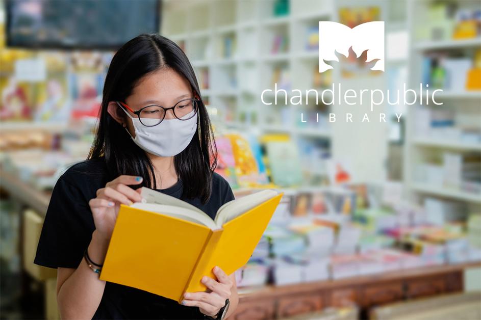 Woman reading a book at a bookstore