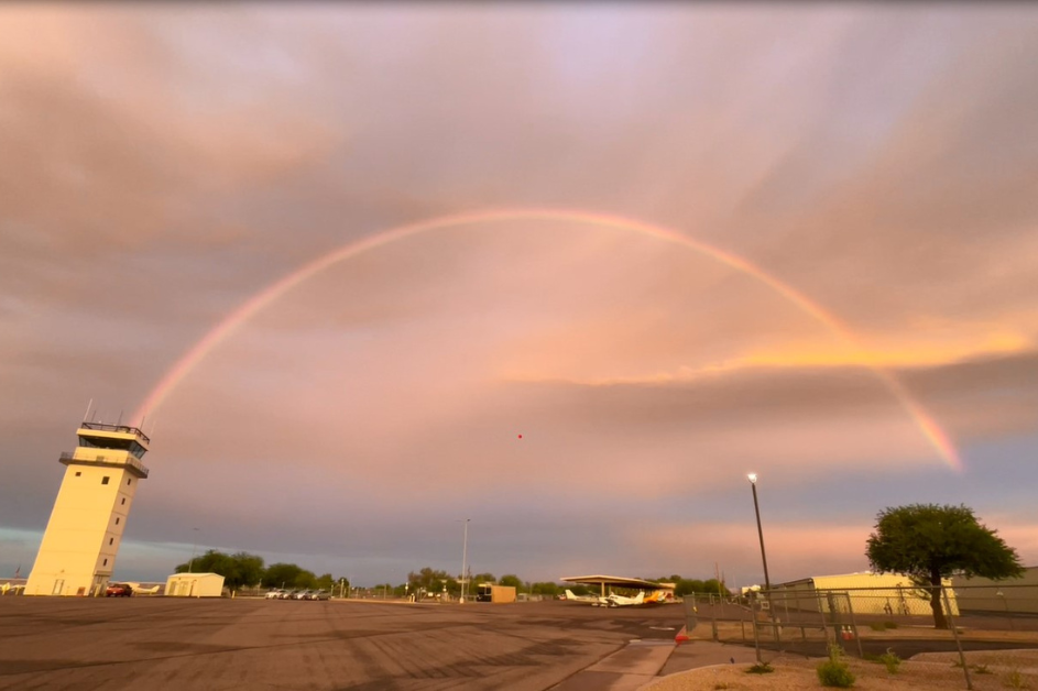 Rainbow appearing across the runway at Chandler Municipal Airport.
