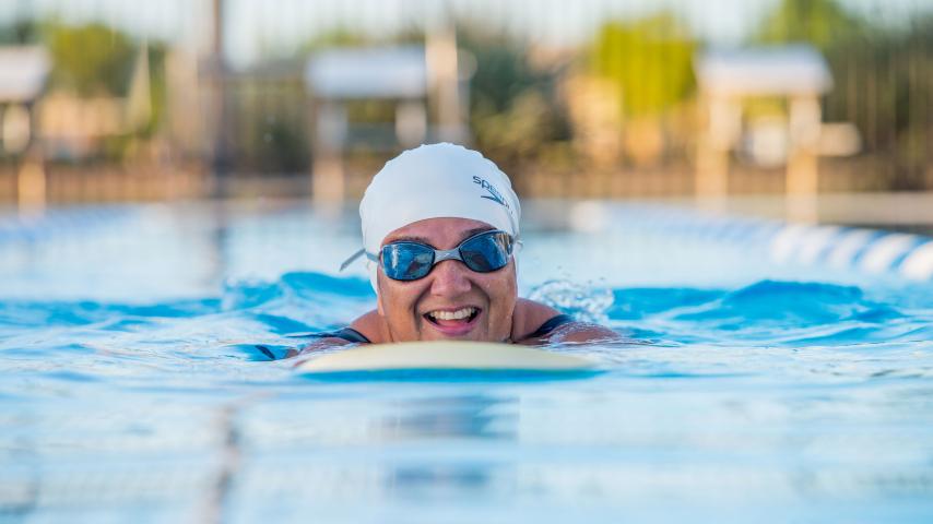 lap swimmer smiling