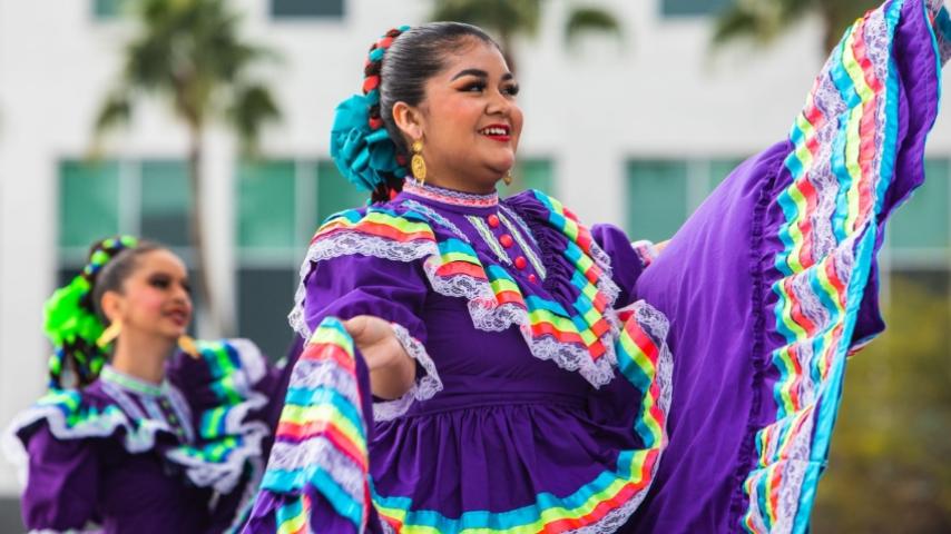 Hispanic dancer performing traditional dances at Chandler Contigo